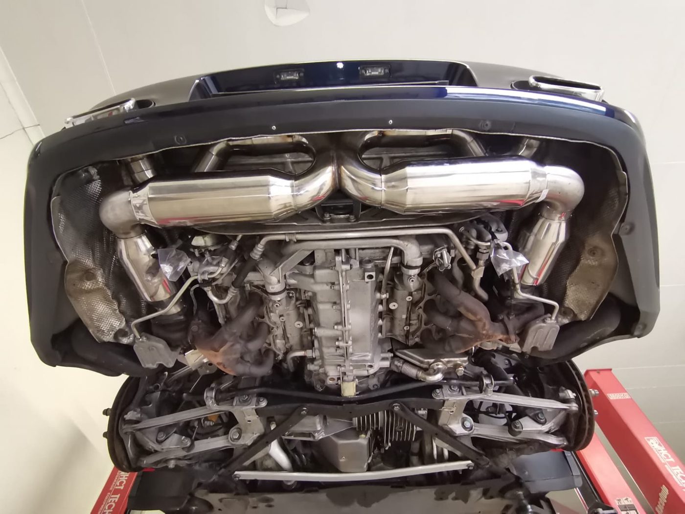 Precision-welded stainless exhaust piping by Venom Racing